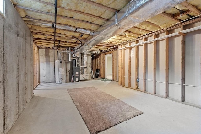108 Green Briar Rd Unit 108, Fitchburg, MA 01420 - unfinished basement featuring gas water heater and heating unit