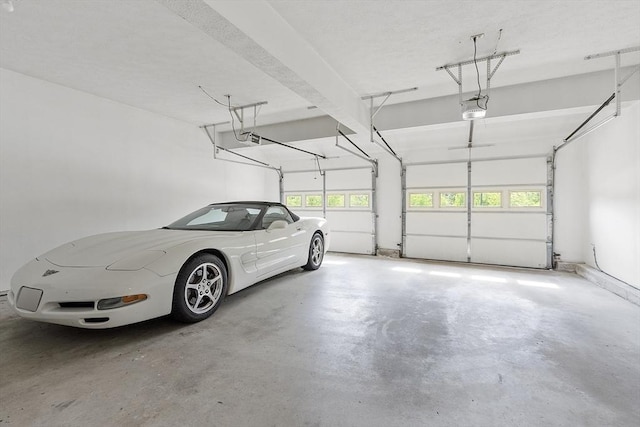 108 Green Briar Rd Unit 108, Fitchburg, MA 01420 - garage featuring a garage door opener