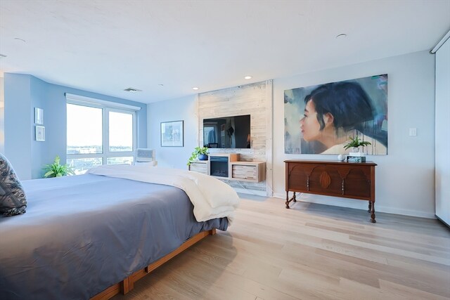 bedroom featuring light hardwood / wood-style flooring