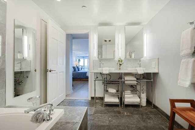 bathroom featuring hardwood / wood-style flooring and vanity