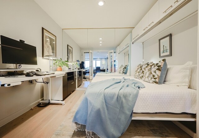 bedroom featuring light hardwood / wood-style flooring