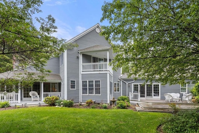 11 Forest Ln Unit 11, Scituate, MA 02066 - back of house with a yard, a deck, and a balcony