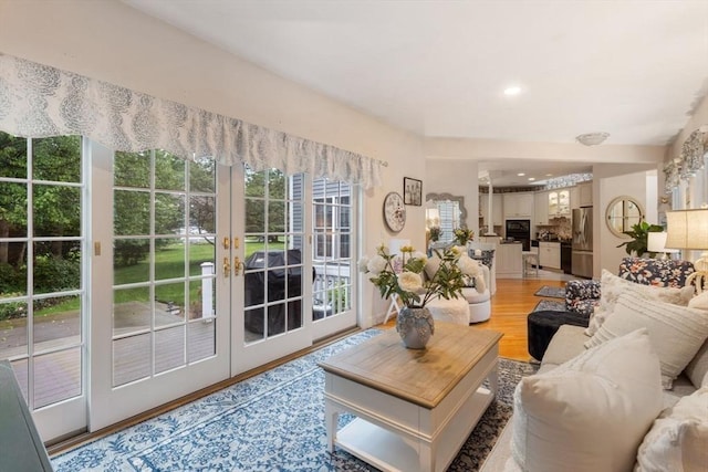 11 Forest Ln Unit 11, Scituate, MA 02066 - living area with french doors, light wood-style floors, and recessed lighting