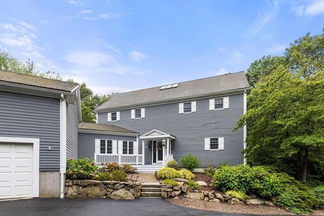 11 Forest Ln Unit 11, Scituate, MA 02066 - colonial home with a porch, a garage, and driveway