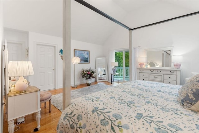 11 Forest Ln Unit 11, Scituate, MA 02066 - bedroom featuring light wood finished floors, vaulted ceiling, and access to exterior