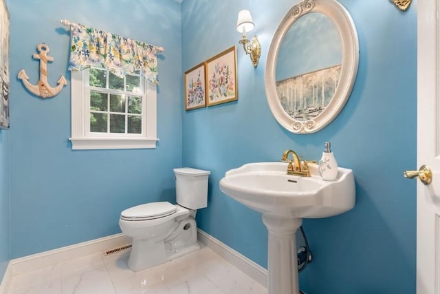11 Forest Ln Unit 11, Scituate, MA 02066 - bathroom featuring baseboards and marble finish floors