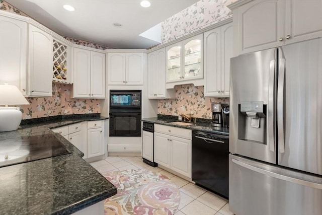 11 Forest Ln Unit 11, Scituate, MA 02066 - kitchen featuring black appliances, light tile patterned flooring, glass insert cabinets, backsplash, and recessed lighting