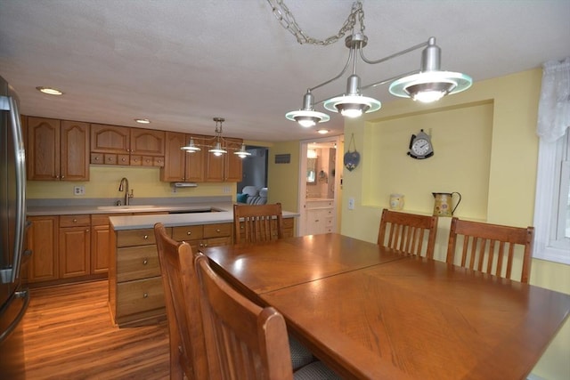 dining area featuring wood finished floors