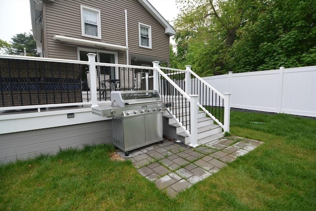 back of property featuring a wooden deck