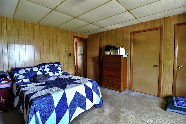 405 Warren St, Fall River, MA 02721 - carpeted bedroom with wood walls and a drop ceiling