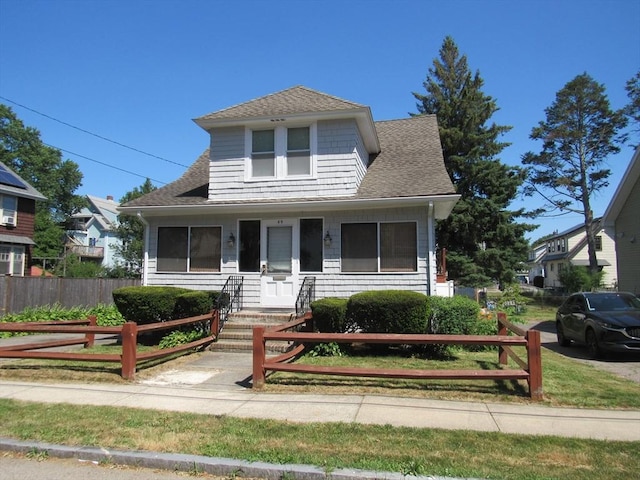 49 Vassall St, Quincy, MA 02170 - bungalow with a fenced front yard and roof with shingles