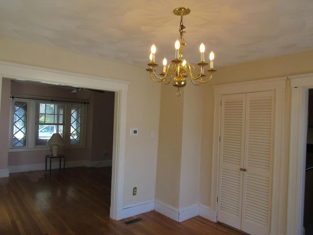 49 Vassall St, Quincy, MA 02170 - unfurnished dining area with a chandelier and wood finished floors