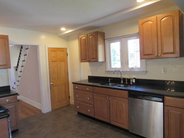 49 Vassall St, Quincy, MA 02170 - kitchen featuring stainless steel dishwasher, dark countertops, recessed lighting, black stove, and brown cabinets