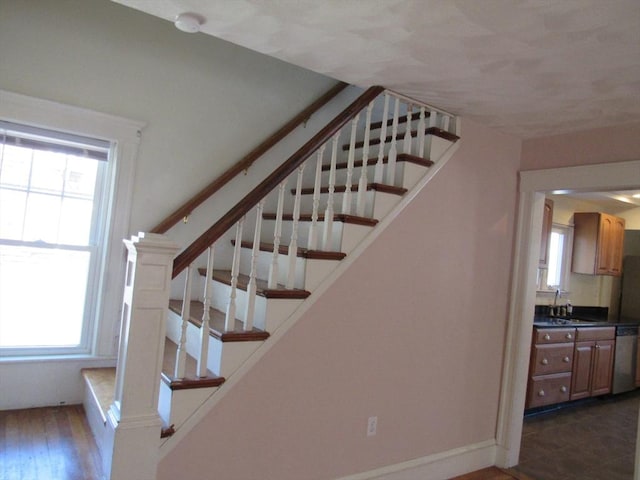49 Vassall St, Quincy, MA 02170 - stairs featuring baseboards
