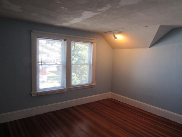 49 Vassall St, Quincy, MA 02170 - bonus room featuring vaulted ceiling and dark wood-style flooring