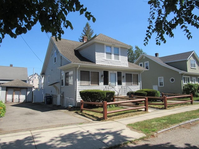 49 Vassall St, Quincy, MA 02170 - bungalow-style home with a fenced front yard, a detached garage, covered porch, and roof with shingles