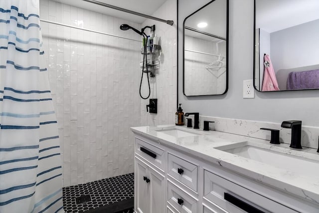 8 Lee Rd, Sharon, MA 02067 - bathroom with double vanity, a sink, and tiled shower