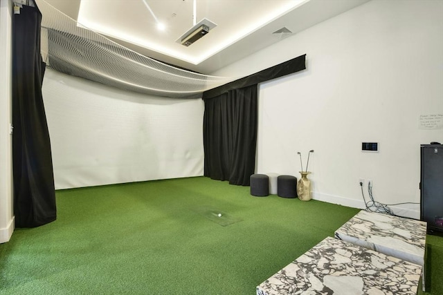 game room featuring carpet floors and golf simulator