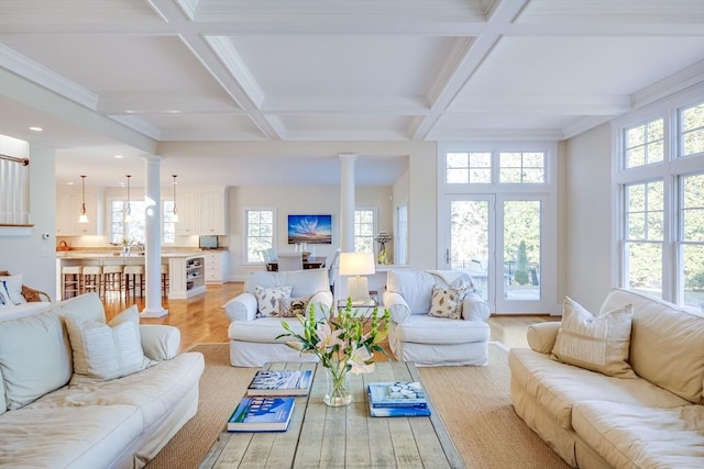 living room with coffered ceiling, decorative columns, light hardwood / wood-style floors, and beamed ceiling