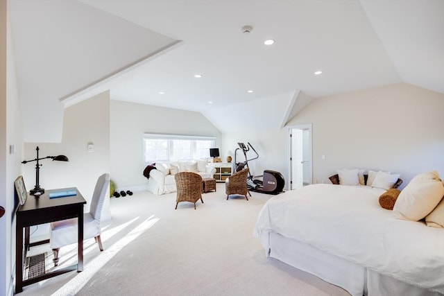 carpeted bedroom with lofted ceiling