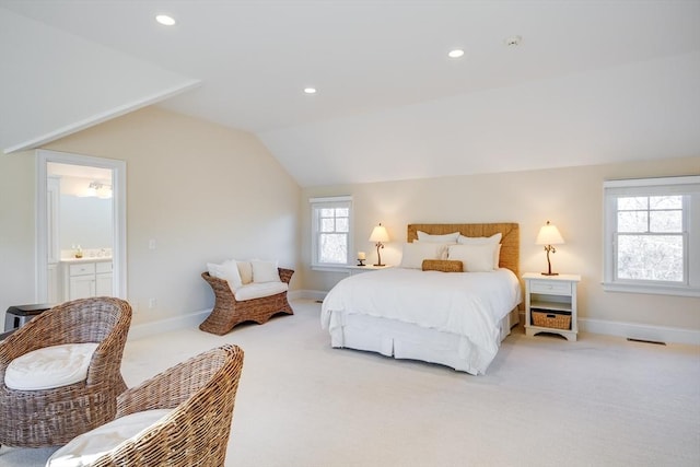 carpeted bedroom featuring lofted ceiling