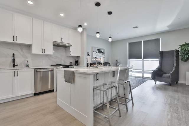 18 Artisan Dr Unit 208, Salem, NH 03079 - kitchen featuring dishwasher, a sink, under cabinet range hood, light wood-style flooring, and recessed lighting
