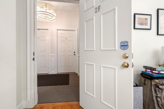 341 Beacon Unit 2F, Boston, MA 02116 - foyer entrance with a chandelier and baseboards
