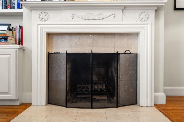 341 Beacon Unit 2F, Boston, MA 02116 - detailed view of a tile fireplace and baseboards