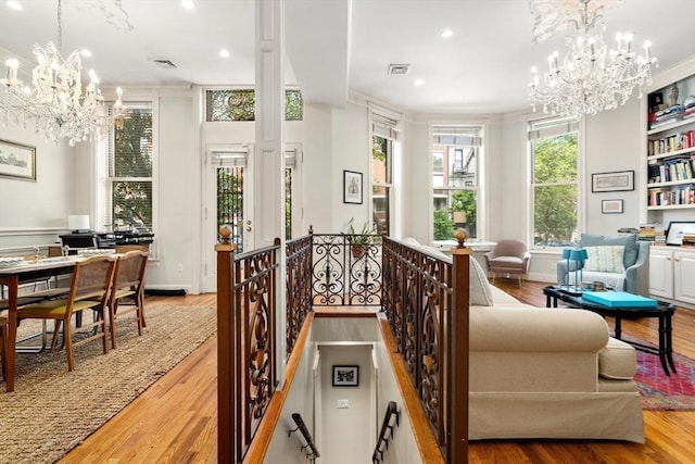 341 Beacon Unit 2F, Boston, MA 02116 - dining space with a chandelier, wood finished floors, recessed lighting, and crown molding