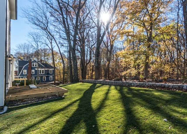 view of yard with a deck