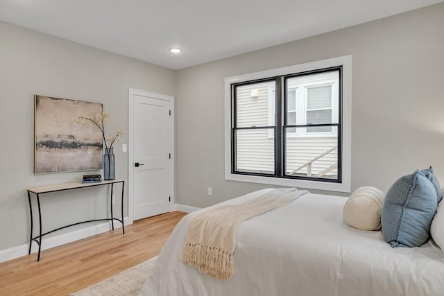 bedroom featuring wood-type flooring