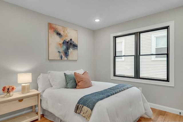 bedroom featuring light wood-type flooring