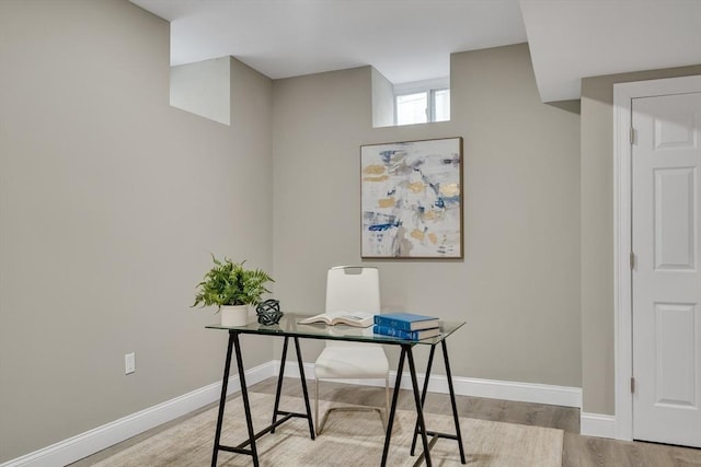 office space featuring light wood-type flooring