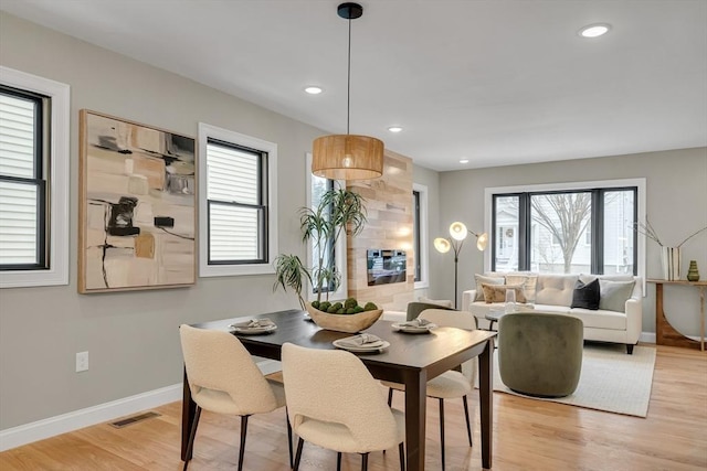 dining room with light hardwood / wood-style floors