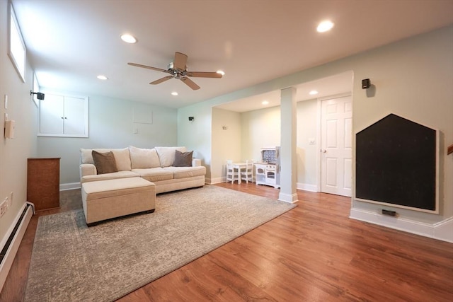 61 Colwell, Dedham, MA 02026 - living room with baseboard heating, wood finished floors, recessed lighting, and ceiling fan