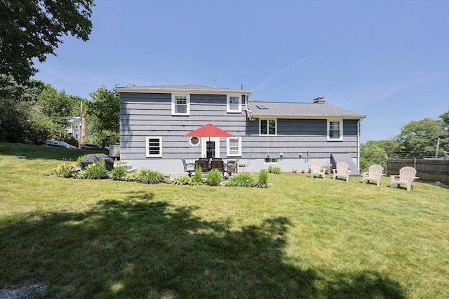 61 Colwell, Dedham, MA 02026 - rear view of property featuring a chimney
