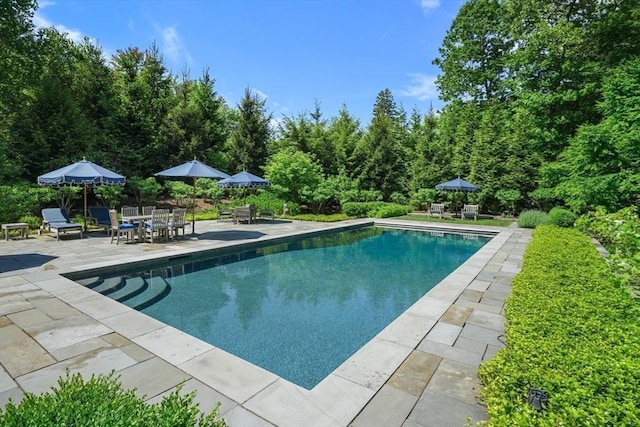 pool with a patio