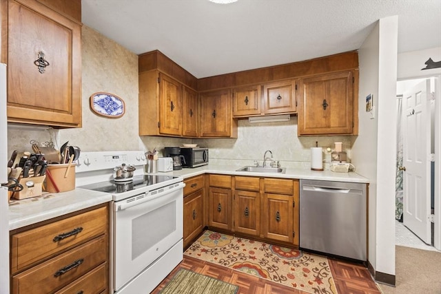 kitchen with sink and stainless steel appliances