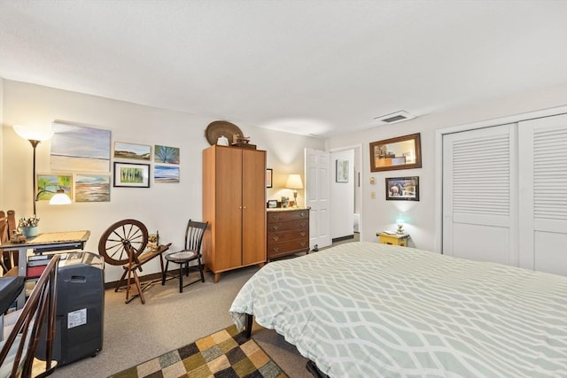 bedroom with a closet and carpet flooring