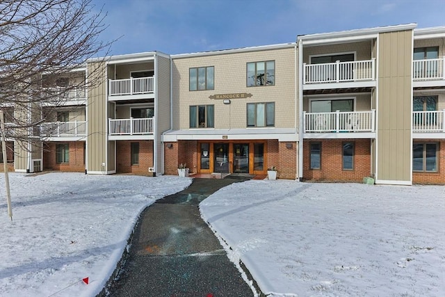 view of snow covered property