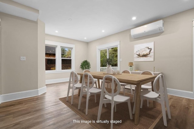 129 S Main St, Raynham, MA 02767 - dining area featuring a wall mounted air conditioner, wood finished floors, baseboards, and recessed lighting