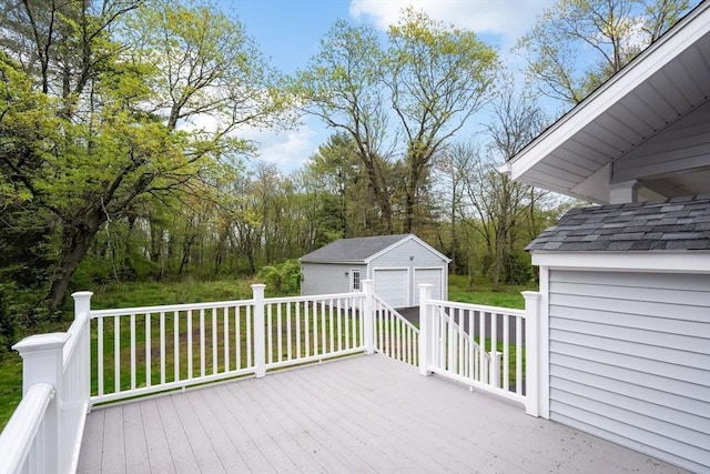 129 S Main St, Raynham, MA 02767 - deck with an outdoor structure and a detached garage