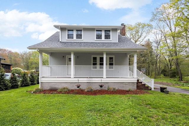 129 S Main St, Raynham, MA 02767 - bungalow-style house with a porch, a chimney, a shingled roof, and a front lawn