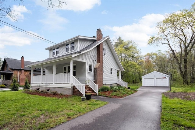 129 S Main St, Raynham, MA 02767 - bungalow-style house featuring an outdoor structure, a garage, a porch, a chimney, and a front yard