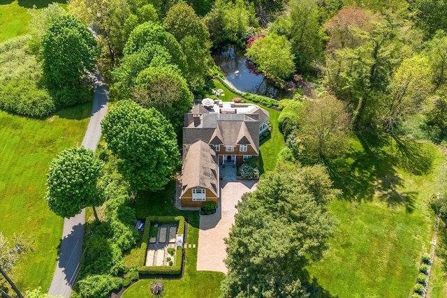 birds eye view of property featuring a water view