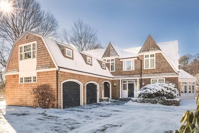 view of front of property featuring a garage