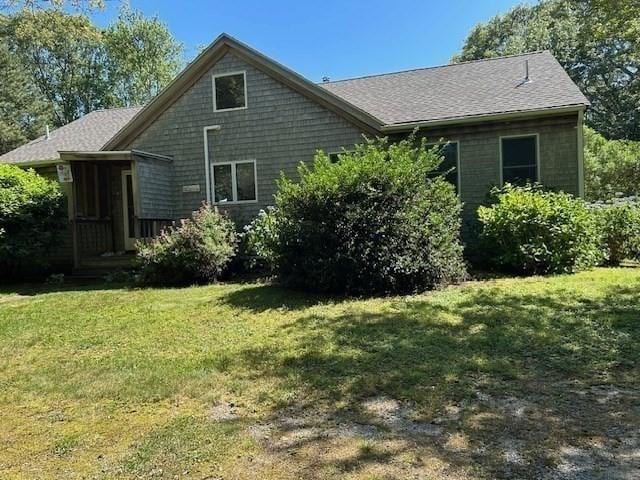 190 Longview Rd, West Tisbury, MA 02575 - rear view of house featuring a lawn and a shingled roof