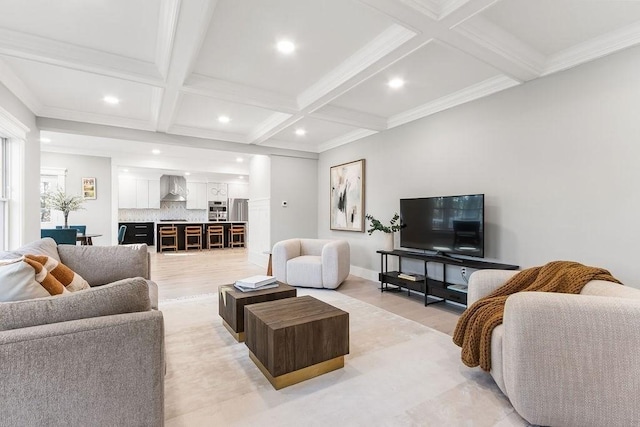 living area featuring light wood-style floors, coffered ceiling, beam ceiling, and recessed lighting