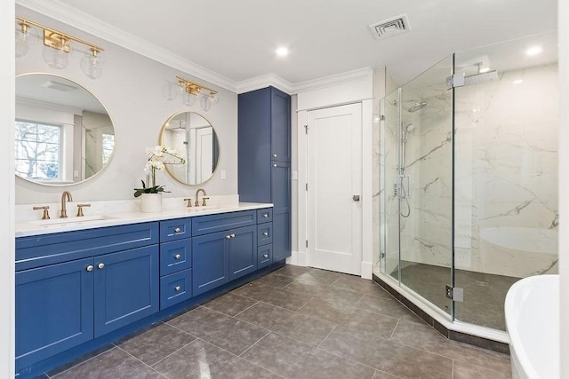 full bathroom with a sink, visible vents, a marble finish shower, double vanity, and crown molding