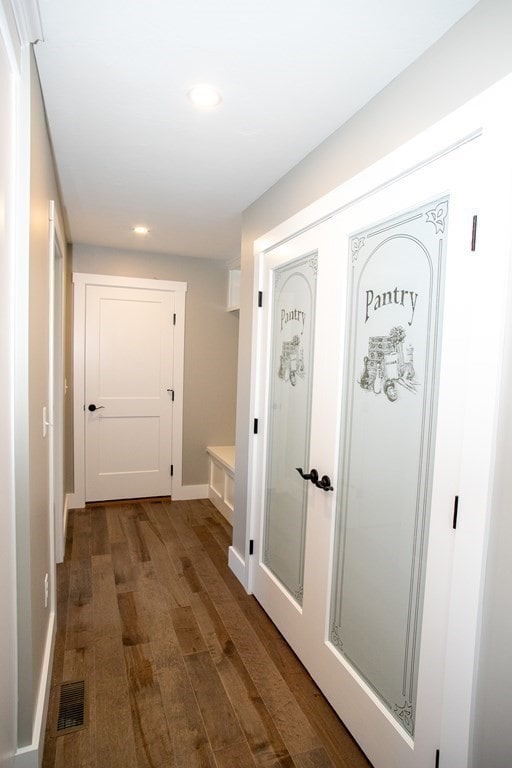 hall featuring dark hardwood / wood-style floors